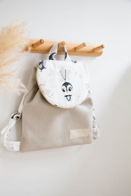Sac cartable Pinguoin etoilé velours beige passepoil doré