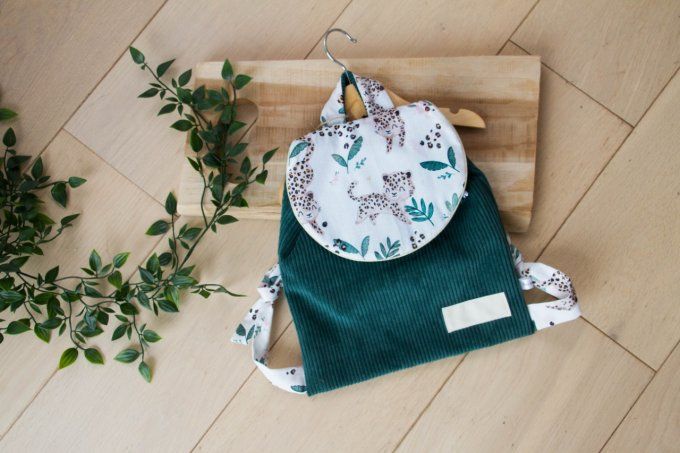 Cartable velours vert panthere en stock 